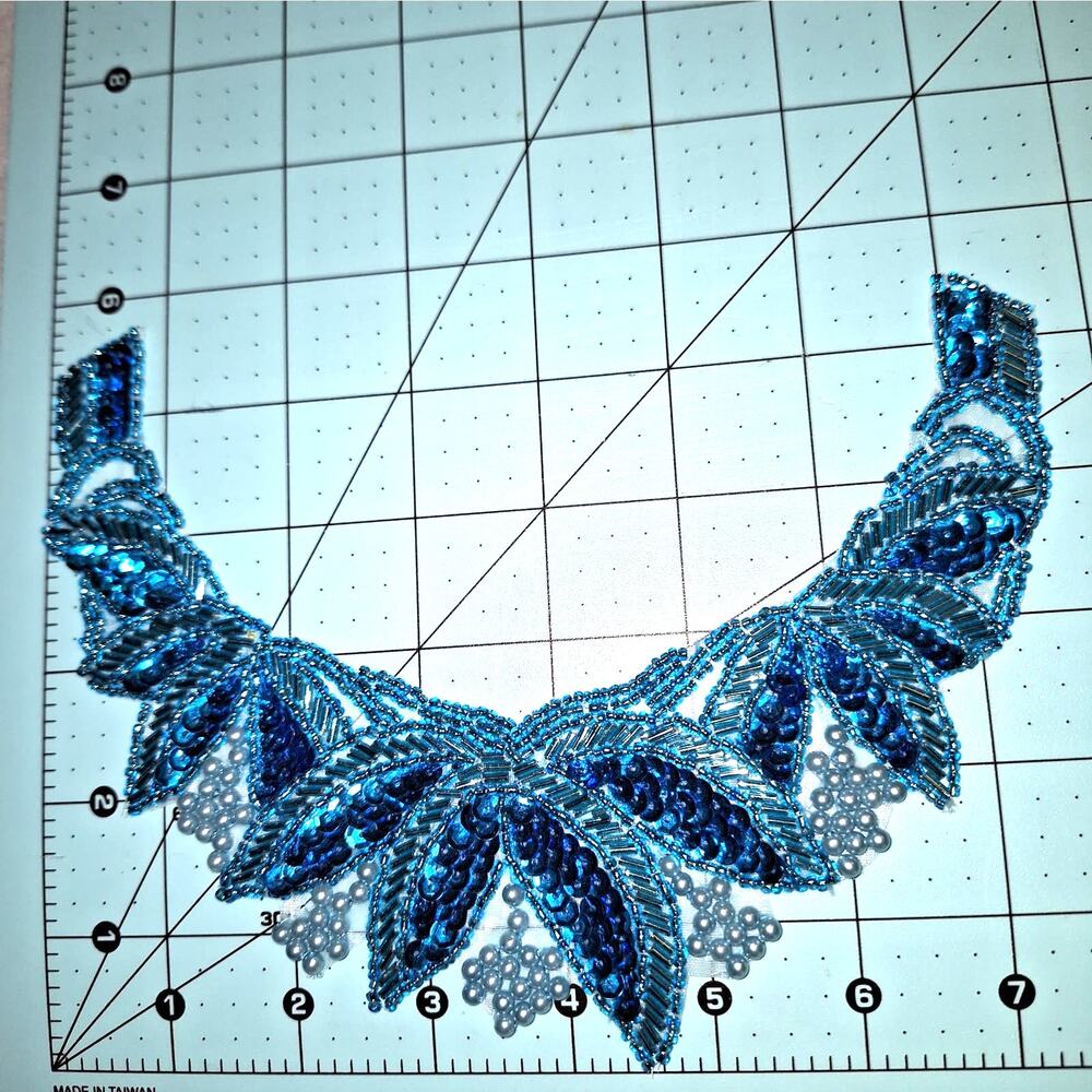 Turquoise bead and sequin neckline applique